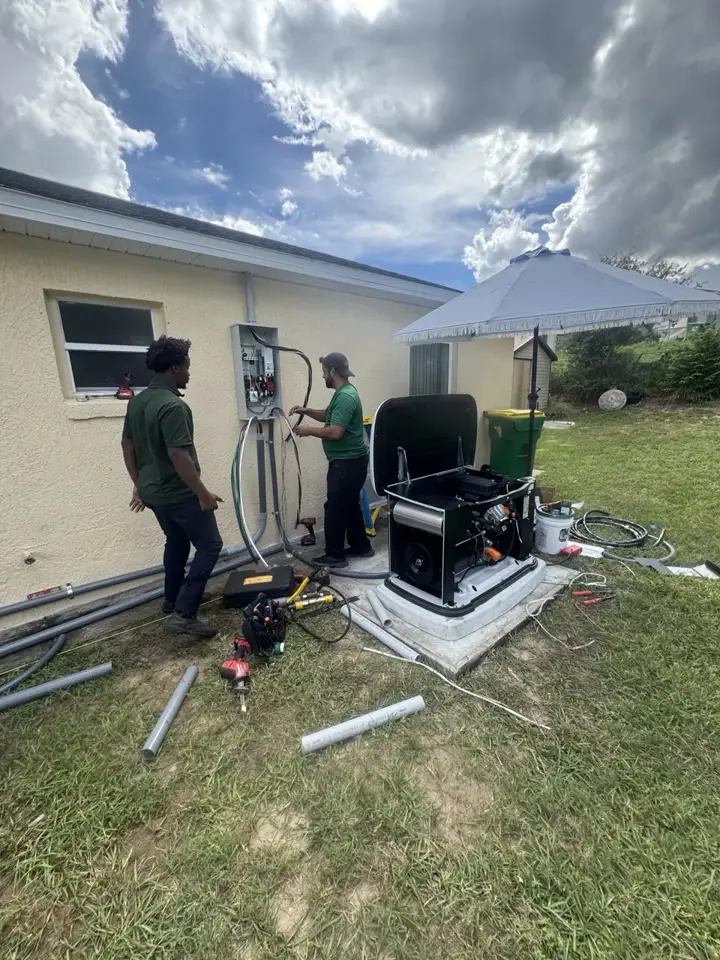 Mister Safety electricians installing a standby generator and transfer switch.