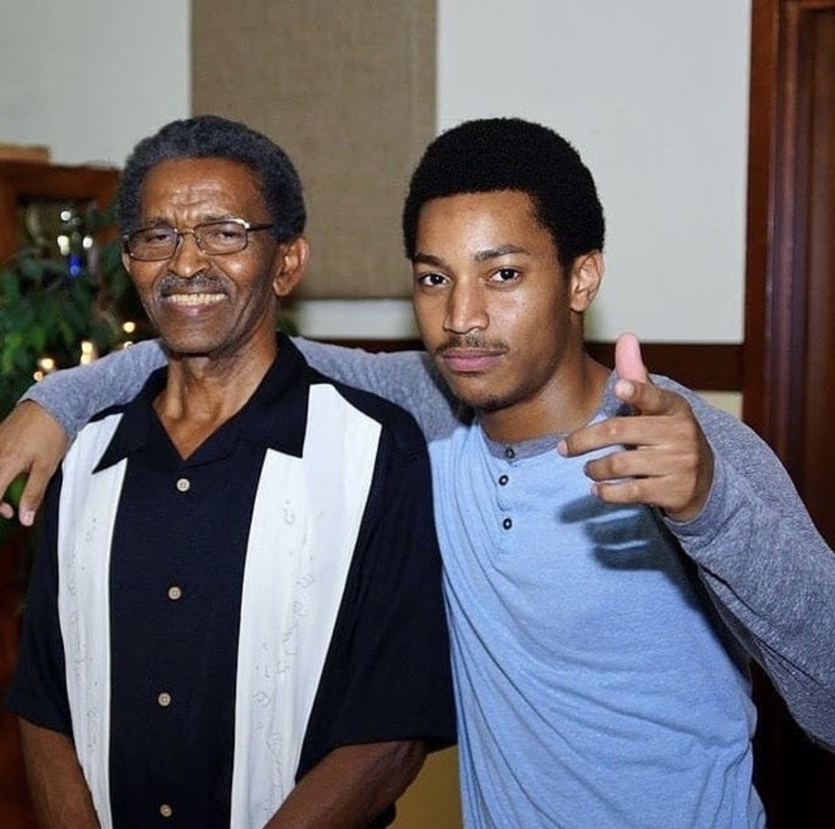 Carl Barclay, left, with his grandson Joshua McLymont.